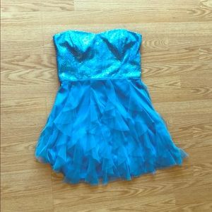 A beautiful blue sequence strapless event dress